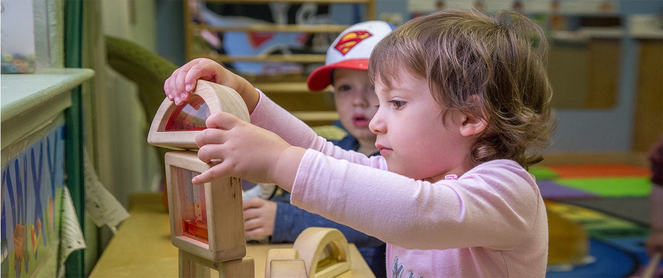 kids building with blocks